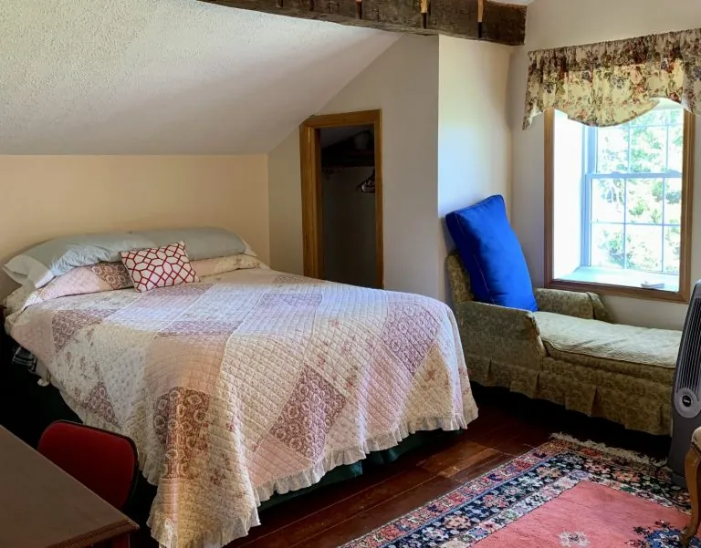 A loft bedroom with exposed beam